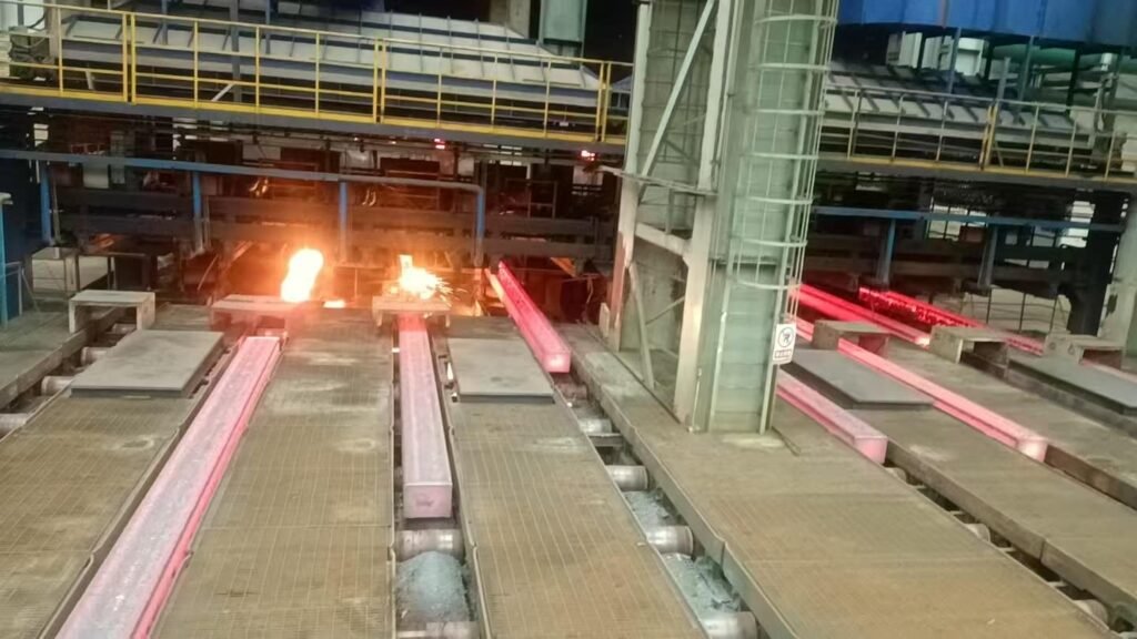 Massive cooling bed system at Ruicheng Steel Tangshan factory, showing the automated transfer of structural steel beams during production